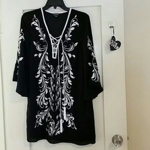 Bebe embroidery dress with lace up tassel trims